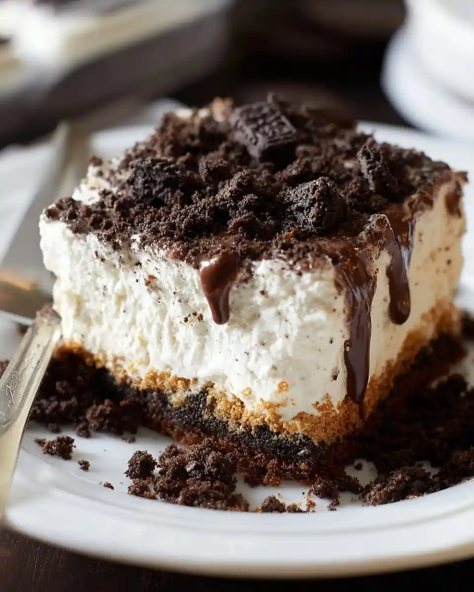 A slice of {{ $('Fetch Recipe Data').first().json["Main Keyword"] }} with cream and chocolate drizzle.