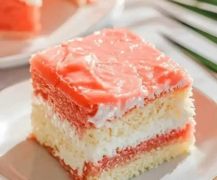 Delicious Hawaiian Guava Cake topped with fresh guava slices and whipped cream