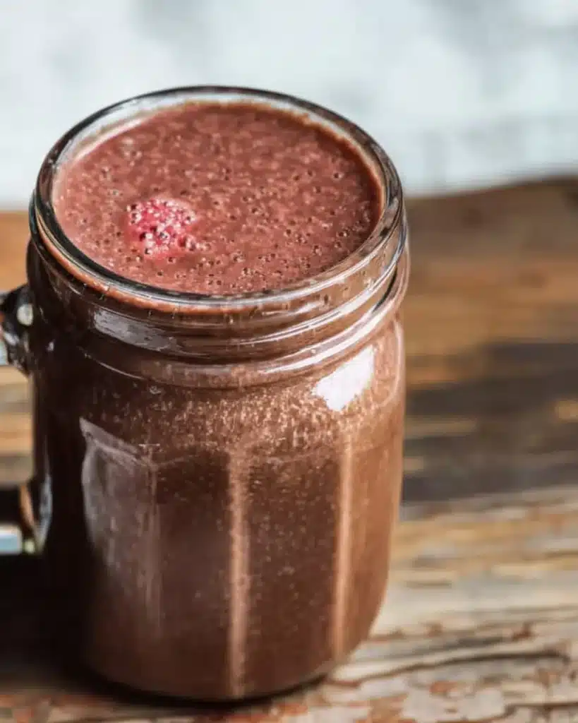 Healthy dark chocolate smoothie with banana and almond milk