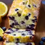 Freshly baked Lemon Blueberry Loaf with vibrant lemon and blueberry toppings