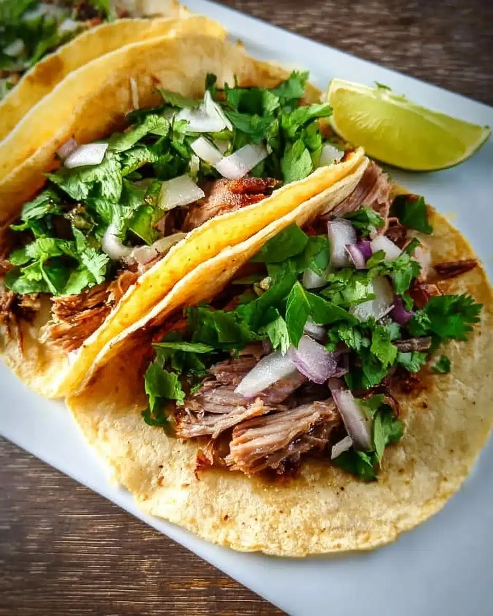 Delicious tacos served on Taco Tuesday with colorful toppings and sides.