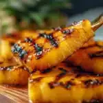 5-Ingredient honey glazed grilled pineapple slices on a serving plate
