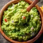 Quick guacamole dip recipe with fresh avocados and herbs